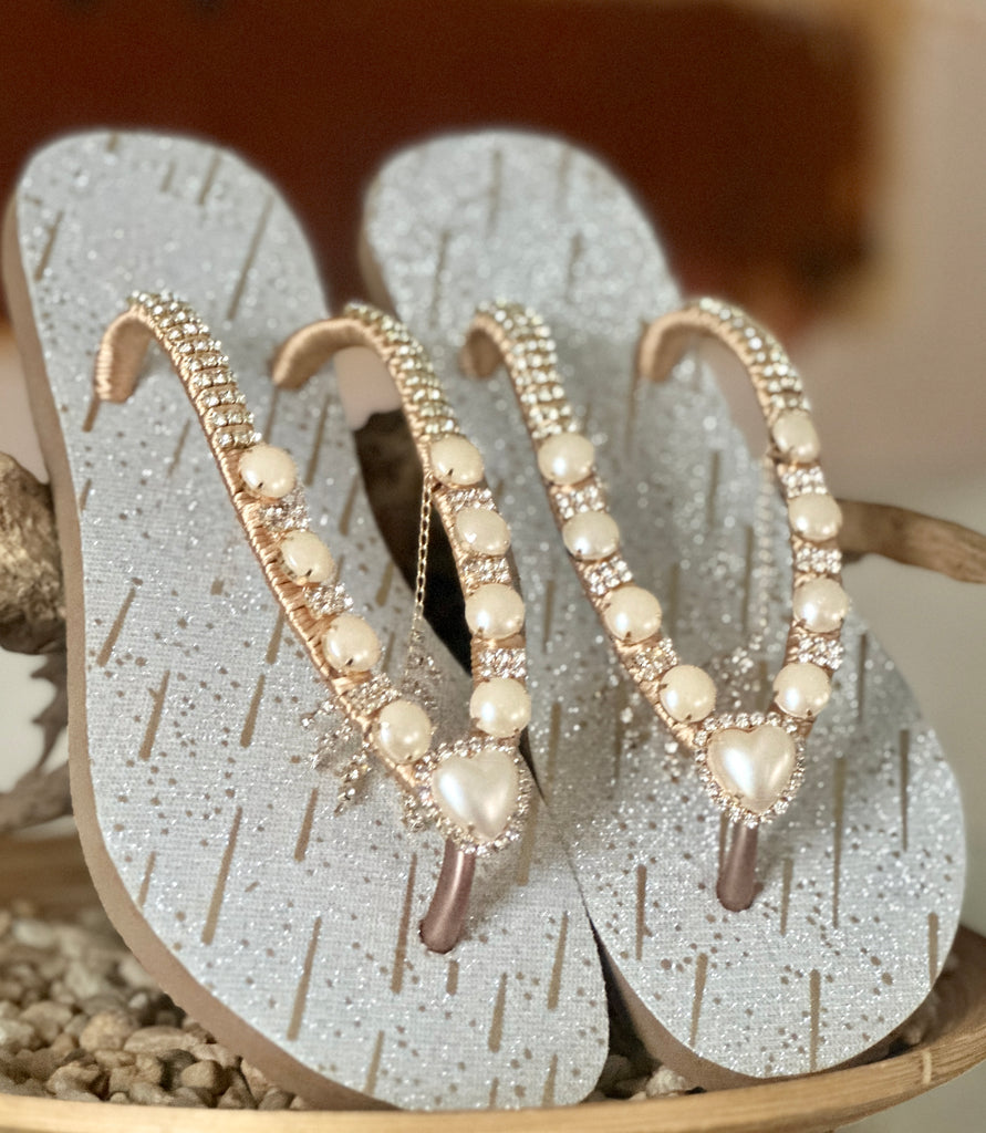 For her special day, gift trendy handmade flip flops, perfect for a stylish cruise vacation, ensuring she steps into relaxation with both flair and comfort