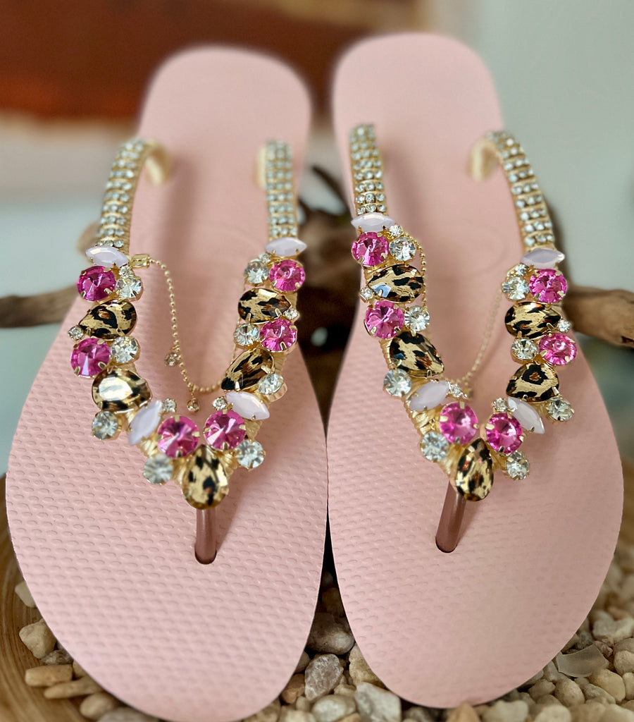 Step into elegance on your beach wedding day with these meticulously crafted custom-made flip flops, tailored to ensure a unique and personalized touch that perfectly complements your special occasion. 